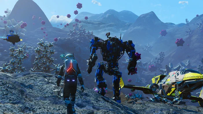 Un astronaute en combinaison spatiale se dirige vers un grand robot bleu noir jaune ainsi qu’un vaisseau spatial sur une planète rocheuse bleue parsemée de formations coralliennes blanches roses flottantes avec des montagnes à l’arrière-plan.