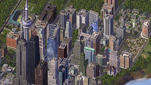 Une capture d'écran du jeu vidéo SimCity 4 Deluxe affichant une vue aérienne dense d'une métropole remplie de gratte-ciels, d'immeubles résidentiels et de parcs verts.