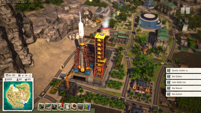 Capture d'écran du jeu vidéo Tropico 5 montrant une vue aérienne d'une île avec des constructions modernes comme un lanceur de fusée et une centrale nucléaire.