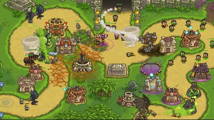 Dans le jeu vidéo Kingdom Rush Frontiers, une vue isométrique montre plusieurs tours défensives et des ennemis dans un environnement cartoon.