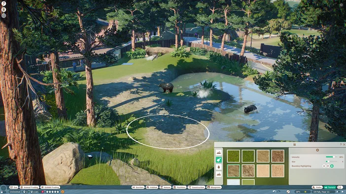Capture d'écran du jeu vidéo Planet Zoo montrant un enclos pour ours dans un paysage verdoyant avec une interface utilisateur en bas à droite