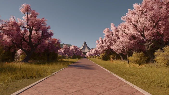 Vue d'un chemin pavé bordé de grands arbres aux fleurs roses, menant vers une structure en forme de tente au loin.