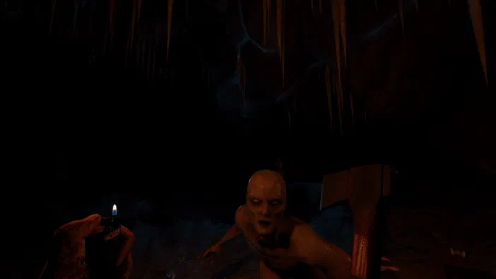 Capture d'écran du jeu vidéo The Forest montrant un personnage nu et effrayé dans une grotte sombre avec des stalactites.