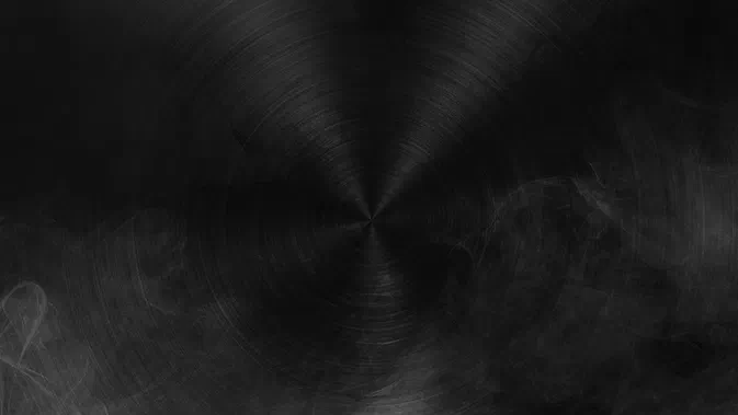 Arrière-plan sombre et texturé présentant des cercles concentriques subtils sur une surface grise.