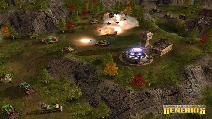 Capture d'écran du jeu vidéo Command & Conquer: Generals montrant une base ennemie explosante au centre-droit, des chars et camions sur un terrain vallonné aux couleurs automnales.