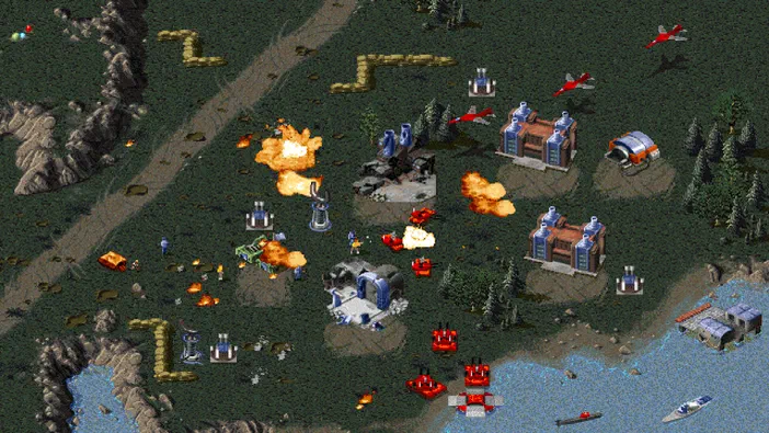 Capture d'écran de Command & Conquer: Red Alert™, Counterstrike™ and The Aftermath™ montrant une bataille avec des véhicules et des explosions sur un terrain en pixel art.
