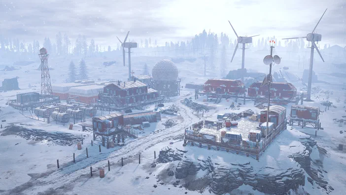 Base dans un environnement enneigé du jeu vidéo Rust avec des bâtiments en bois sur pilotis, des éoliennes et d'autres structures industrielles.