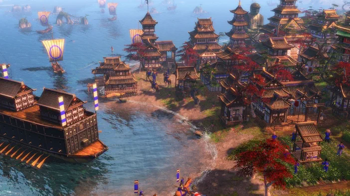 Vue aérienne d'une ville côtière avec des bâtiments traditionnels asiatiques en bois, un grand navire amarré et des soldats dans le jeu vidéo Age of Empires III.