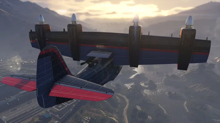 Un avion de transport militaire bleu et rouge à quatre hélices vole au-dessus d'un paysage montagneux avec une rivière dans le jeu vidéo Grand Theft Auto V Legacy.