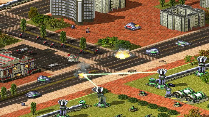 Capture d'écran de Command & Conquer : Red Alert 2 et Yuri's Revenge montrant une bataille urbaine avec des chars, des soldats et des explosions dans un environnement en vue isométrique.