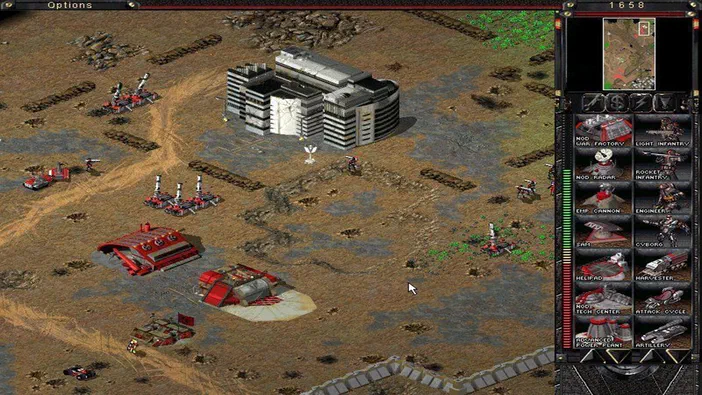 Capture d'écran du jeu de stratégie Command & Conquer Tiberian Sun montrant une base NOD avec des bâtiments et unités sur un terrain désertique.