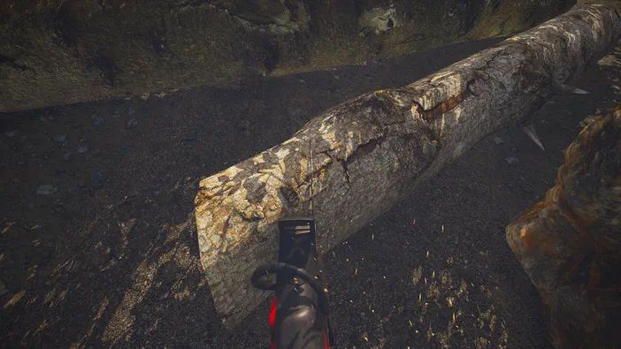 Capture d'écran du jeu Dinosaur Fossil Hunter montrant une tronche de bois en train d'être sciée par un scie à chaîne dans un environnement rocheux.