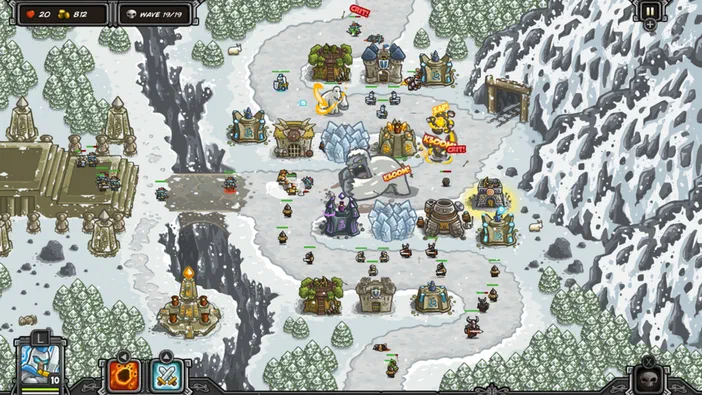 Capture d'écran du jeu de stratégie Kingdom Rush montrant une carte enneigée avec des tours défensives et des ennemis en combat.