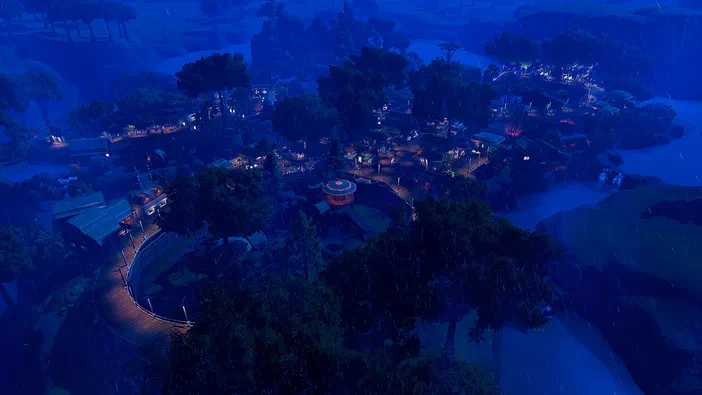 Vue aérienne d'un zoo virtuel dans le jeu Planet Zoo sous la pluie avec des bâtiments éclairés et des sentiers en bois.