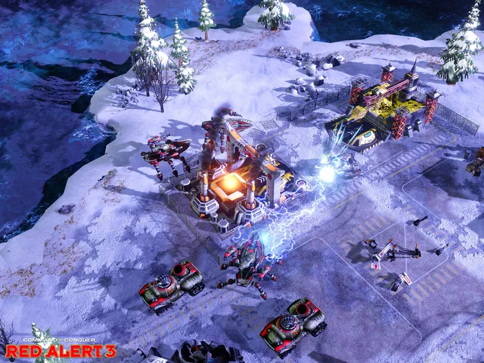 Capture d'écran de Command & Conquer Red Alert 3 montrant une base militaire dans un paysage enneigé avec des véhicules et structures en action.