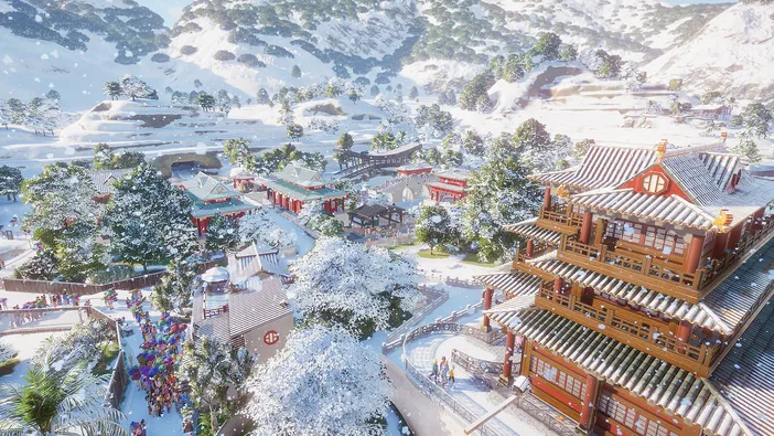 Vue aérienne d'une zoo enneigée dans le jeu Planet Zoo avec des bâtiments traditionnels et des visiteurs.