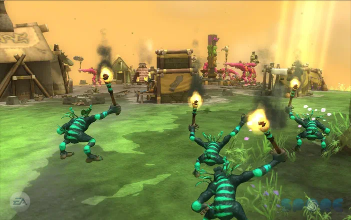 Dans le jeu vidéo Spore, plusieurs créatures vertes à rayures tiennent des torches allumées dans un village sous un ciel orangé.