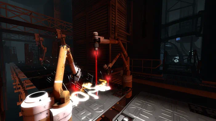 Capture d'écran de Portal 2 montrant des bras robotiques jaunes effectuant une soudure laser sur un plateau métallique dans une usine sombre.