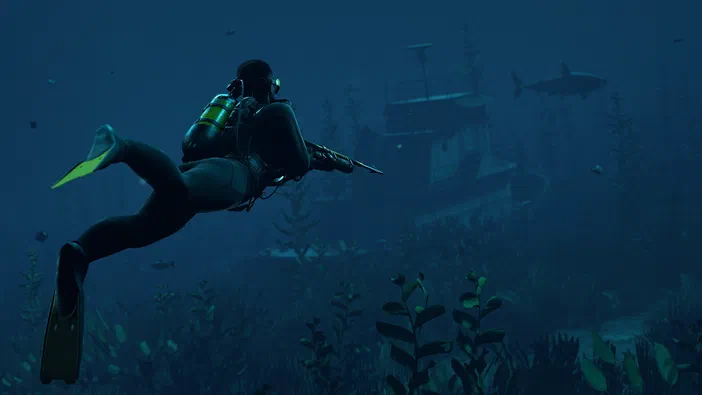 Dans le jeu Rust, un joueur équipé d'un gilet de plongée et tenant une arme nage sous l'eau devant des épaves.