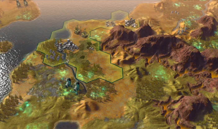 Capture d'écran du jeu Sid Meier's Civilization: Beyond Earth montrant une carte hexagonale avec des unités et de la végétation sur un terrain aride.