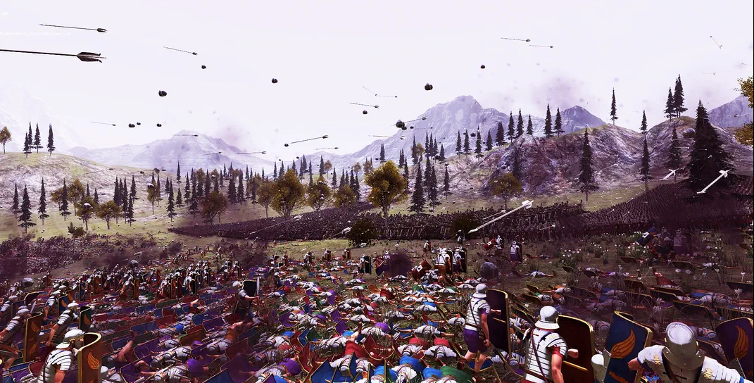 Ultimate Epic Battle Simulator Capture d'écran du jeu Ultimate Epic Battle Simulator montrant une bataille massive avec des centaines de soldats romains et ennemis sur un terrain vallonné, sous la pluie.
