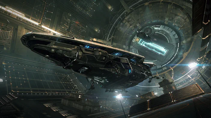 Capture d'écran du jeu vidéo Elite Dangerous montrant un vaisseau spatial au-dessus d'une station orbitale.