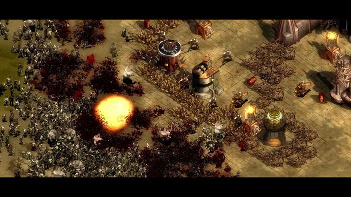 Dans le jeu vidéo They Are Billions, une base fortifiée avec des tours de défense et des barricades est attaquée par une immense armée d'ennemis qui déferle sur la gauche.