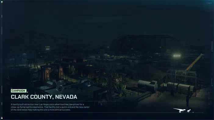 Écran de chargement du jeu Jurassic World Evolution affichant une base nocturne à Clark County, Nevada avec des chèvres et un texte sur le succès éthique.