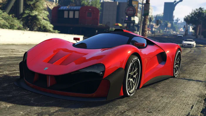 Grand Theft Auto V Legacy : une voiture rouge sportive sur une route urbaine