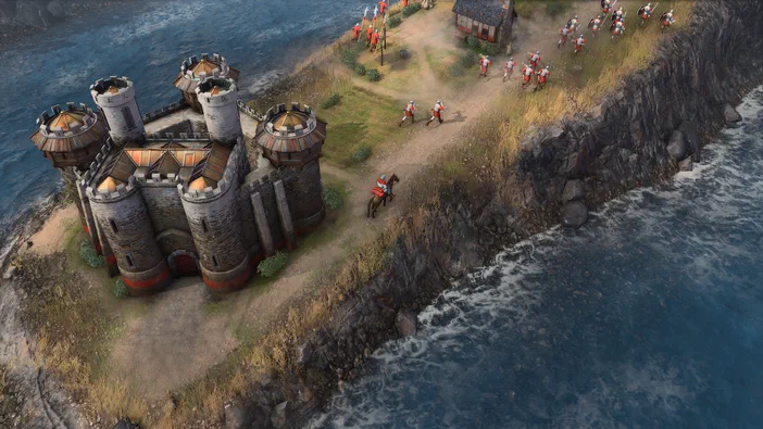 Capture de jeu vidéo Age of Empires IV montrant un château médiéval sur une falaise avec des troupes en formation.