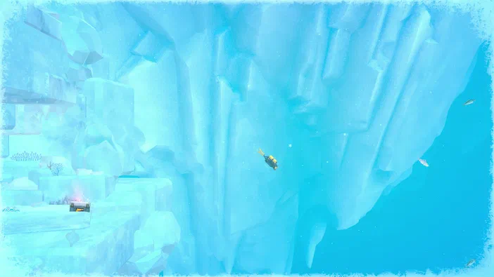 Dans le jeu Dave the Diver, un personnage plonge au milieu d'une grotte de glace bleue parsemée de poissons.