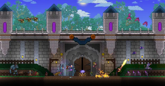 Capture d'écran du jeu Terraria montrant une bataille au pied d'un château en pierre avec des créatures et des projectiles.