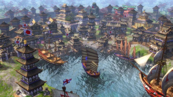 Vue aérienne d'une ville historique avec des bâtiments en bois et plusieurs navires à voiles dans un port.