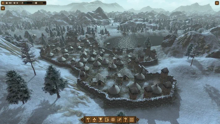 Capture d'écran du jeu Dawn of Man montrant un village fortifié en hiver dans une vallée montagneuse.