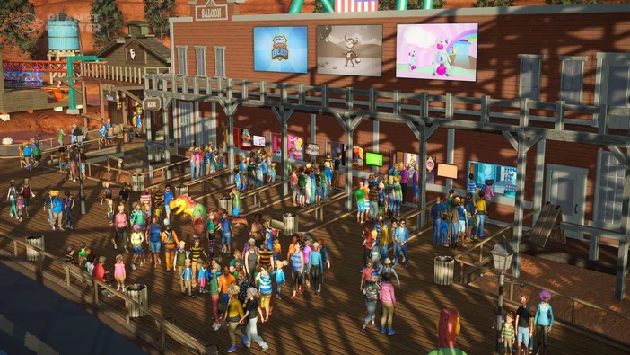 Vue de la gare dans Planet Coaster avec des visiteurs et un bâtiment en bois.