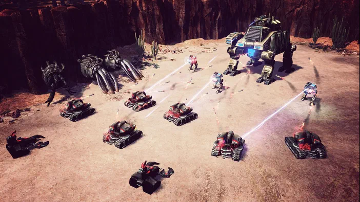 Dans Command & Conquer™ 4 Tiberian Twilight, une armée de chars rouges et d'unités géantes affronte des soldats dans un canyon désertique.