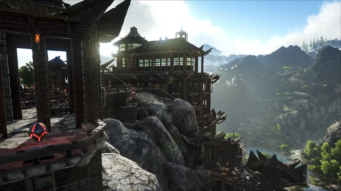 Vue d'une base en bois construite sur un rocher dans le jeu ARK: Survival Evolved