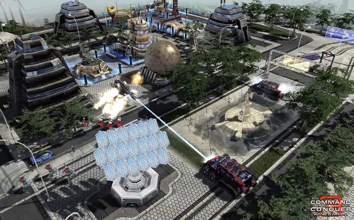 Capture d'écran du jeu vidéo Command & Conquer 3: Kane's Wrath montrant une base militaire avec des véhicules et un radar en action dans un environnement urbain.