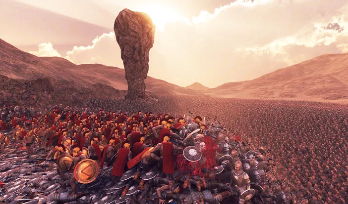 Capture d'écran du jeu vidéo Ultimate Epic Battle Simulator montrant une armée de soldats en combat dans un paysage désertique avec une formation rocheuse au loin.