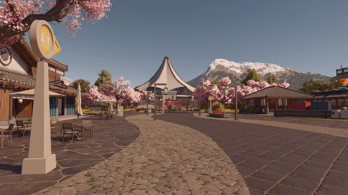 Vue d'un village en style japonais avec des cerisiers, un bâtiment à toit pointu et une montagne enneigée au loin.