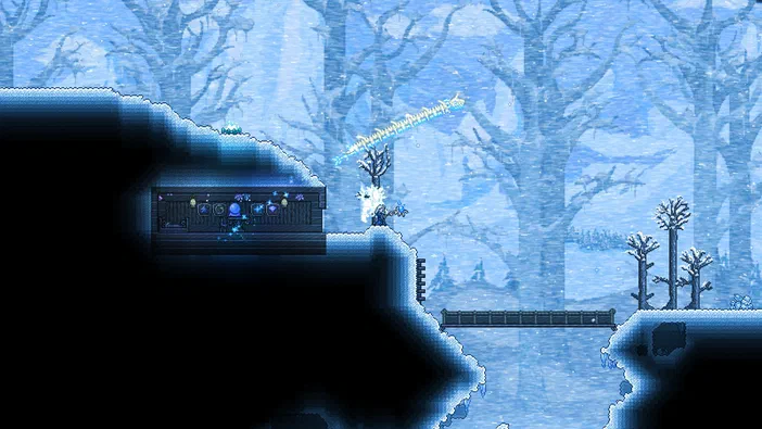 Capture d'écran du jeu Terraria montrant un personnage dans une forêt enneigée avec des arbres et une structure en bois.