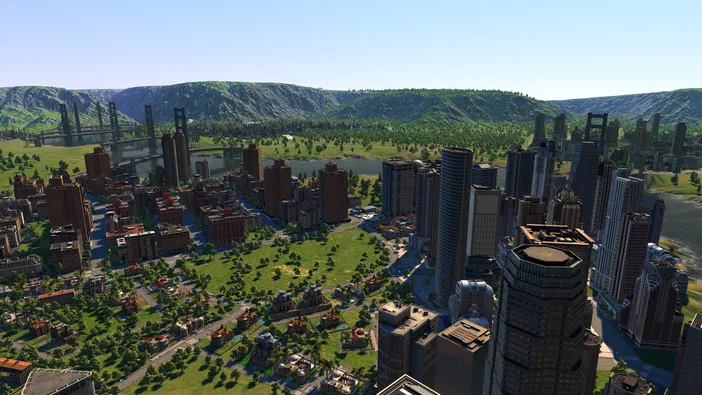 Vue aérienne d'une ville simulée dans Cities XL Platinum avec des gratte-ciels et un paysage verdoyant.