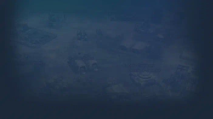 Command & Conquer 3: Tiberium Wars™ : fond d'écran montrant une base militaire avec des véhicules et structures dans un environnement brumeux