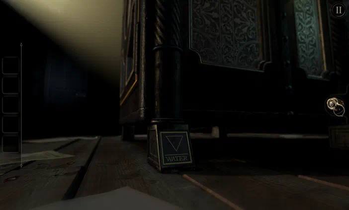 Capture d'écran du jeu vidéo The Room montrant un mécanisme de serrure complexe en bois sombre avec une étiquette 'WATER' et des symboles géométriques.