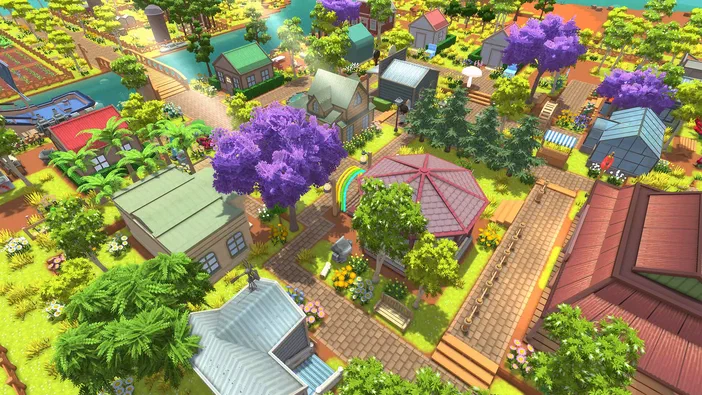 Vue aérienne d'un village coloré du jeu vidéo Dinkum avec des maisons aux toits variés, de grands arbres violets et un arc-en-ciel.