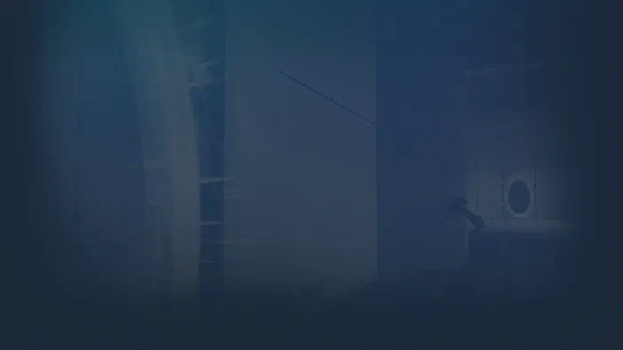 Vue sombre d'un couloir de laboratoire futuriste dans le jeu vidéo Portal.