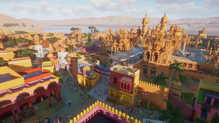 Vue aérienne d'une ville colorée et animée dans le jeu Planet Zoo