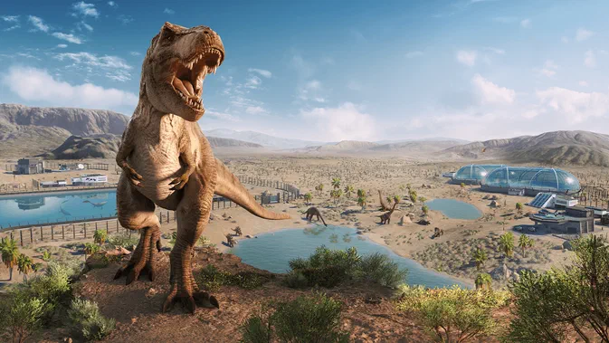 Dans Jurassic World Evolution 2, un T-Rex se tient sur une colline au premier plan d'un parc de dinosaures en construction avec des enclos et des bâtiments futuristes.