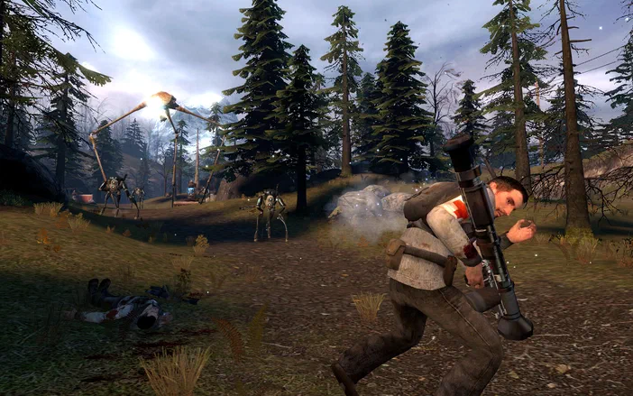 Dans Half-Life 2, un personnage armé d'un lance-roquettes court dans une forêt tandis que des créatures mécaniques et un grand robot se tiennent en arrière-plan.
