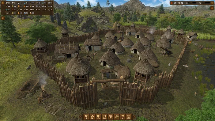 Vue aérienne d'un village préhistorique dans le jeu Dawn of Man, entouré de palissades en bois et composé de huttes à toit de chaume sur un terrain verdoyant.